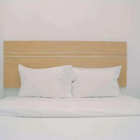Furnished And Relaxing 2Br Bassura City Apartment Near Mall By Travelio